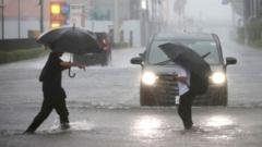 typhoon dujuan hits japan, japan evacuation orders, super el niño storms, tokyo transport cancellations, typhoon dujuan damage update editorial analysis 2026